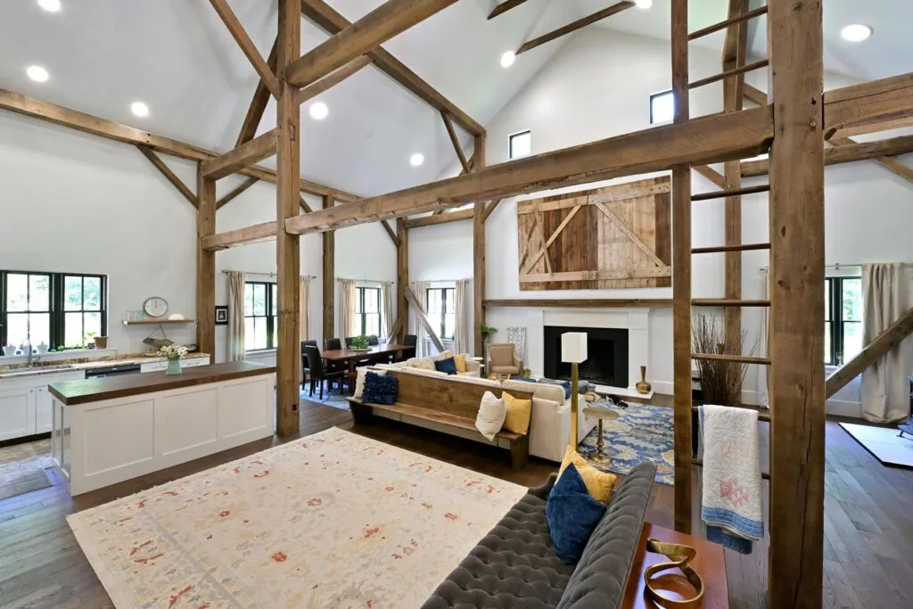 Open-concept living space with sawn oak timber frame in the Delaware, Ohio barn home conversion