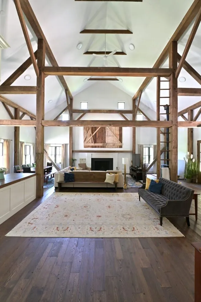 Two-story reclaimed timber frame entry during the Delaware, Ohio barn home conversion