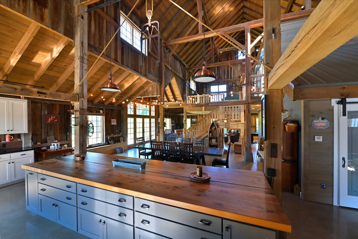 Living space combining modern finishes with the historic red oak timber frame in Newcomerstown, Ohio