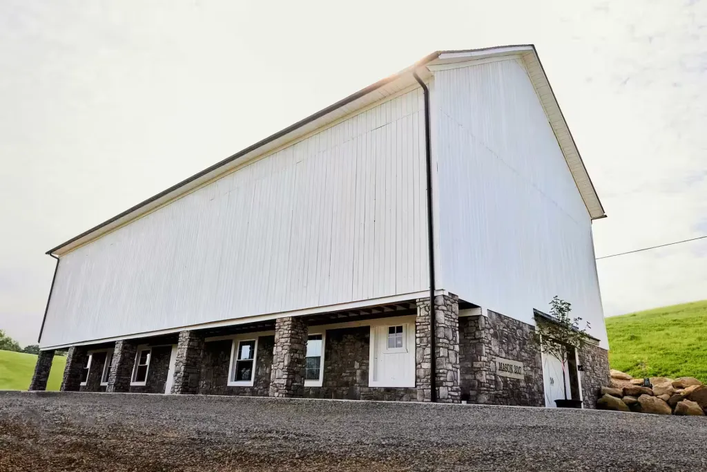 Restored timber frame and new tongue-and-groove flooring inside the Mason Farms barn in Dover, Ohio