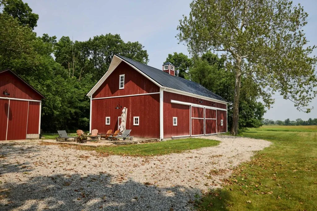 Miller Barn restoration in Oak Harbor, Ohio — red barn surrounded by green farmland