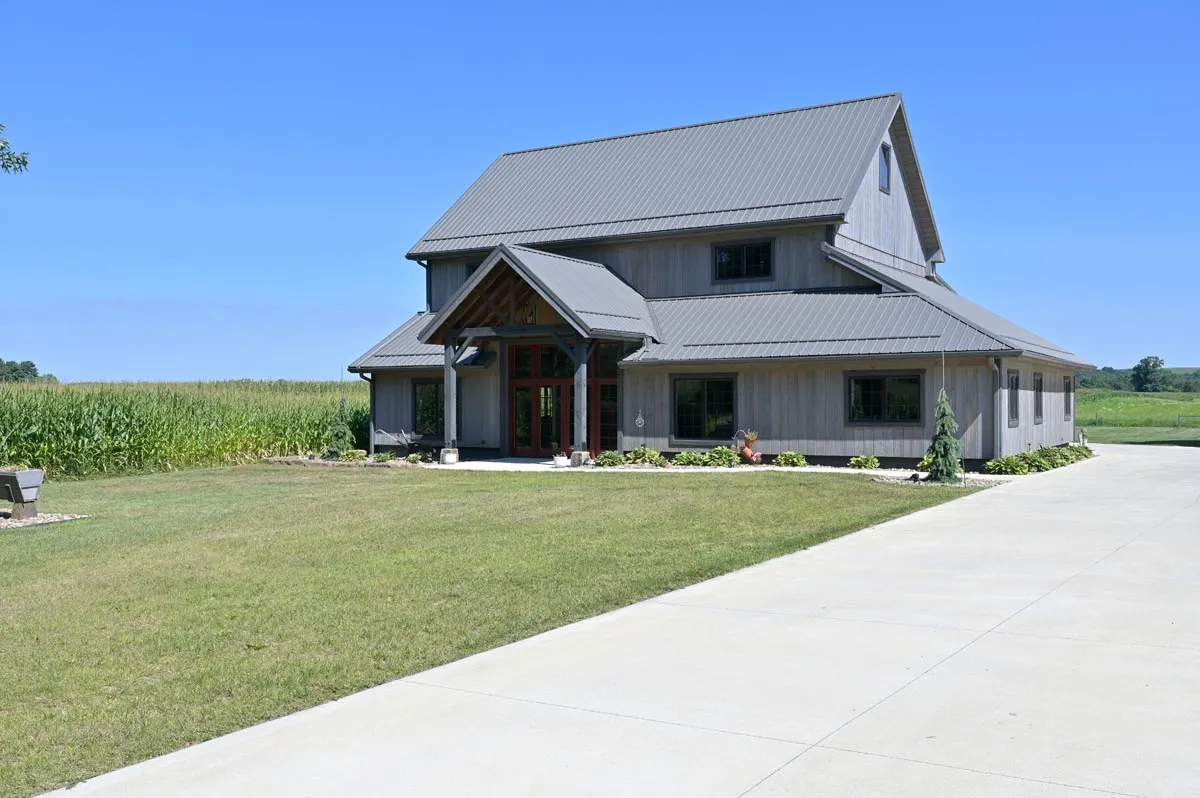 Renovated early-1900s red oak barn frame during the Newcomerstown, Ohio barn home conversion